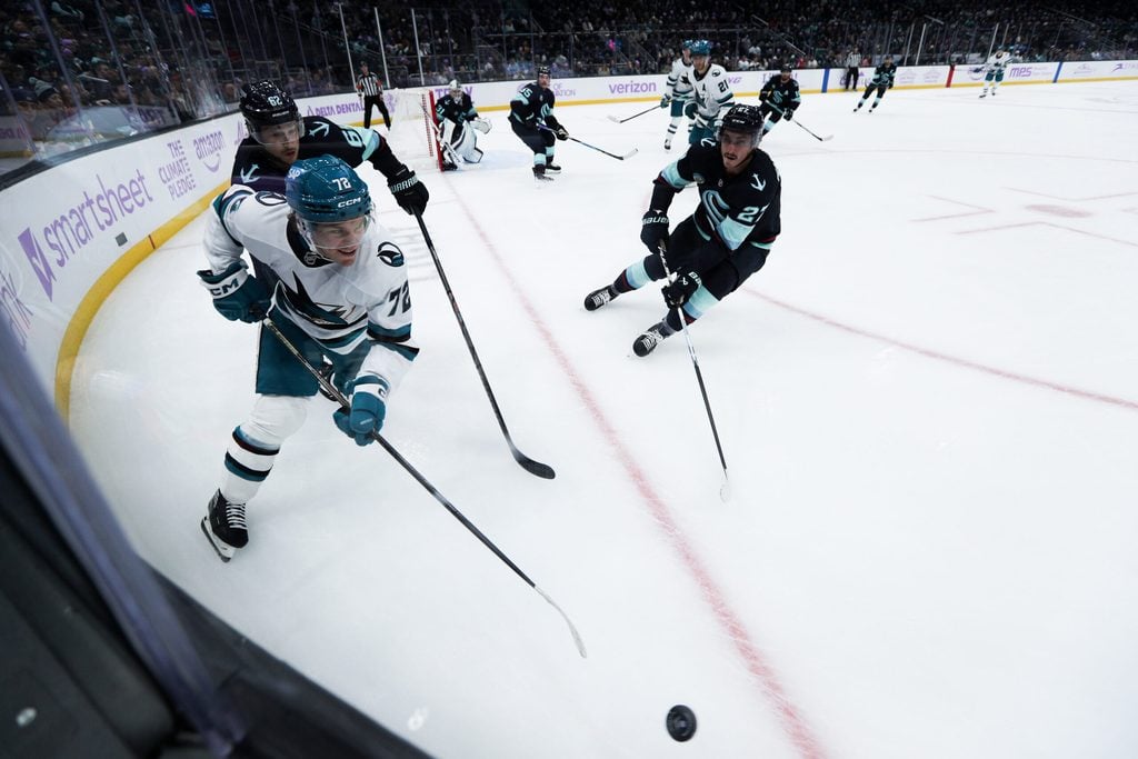 Nov 15, 2025; Seattle, Washington, USA; San Jose Sharks left wing William Eklund (72) drives the puck in the second period against the Seattle Kraken at Climate Pledge Arena. Mandatory Credit: Kevin Ng-Imagn Images