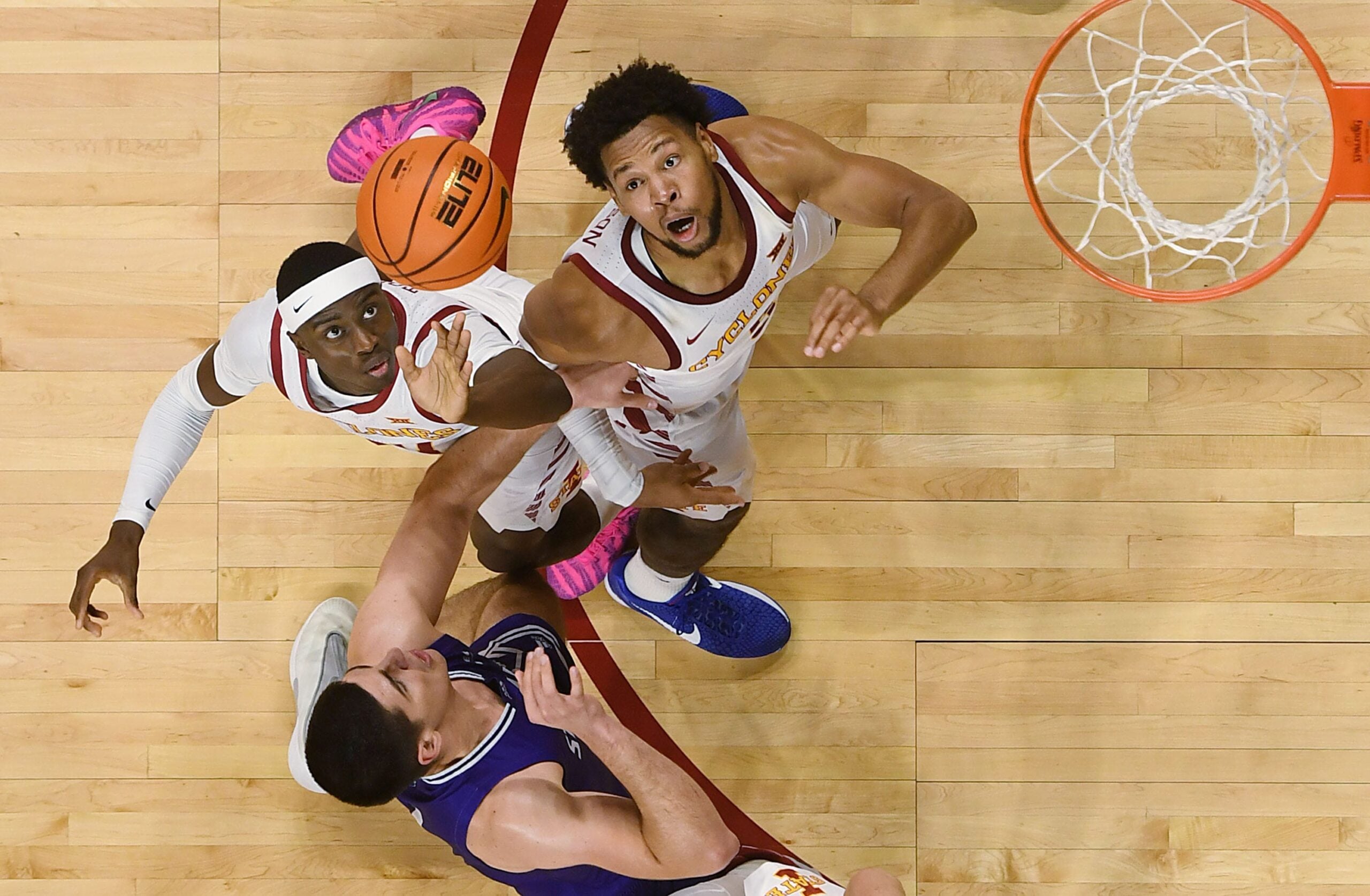Iowa State Cyclones forward ard Killyan Toure (27), Iowa State Cyclones forward Joshua Jefferson (5) and Stonehill Skyhawks forward/center Ridvan Tutic (11) battle for a rebound the ball during the second half in the NCAA basketball on Nov. 17, 2025, at Hilton Coliseum in Ames, Iowa.Iowa.