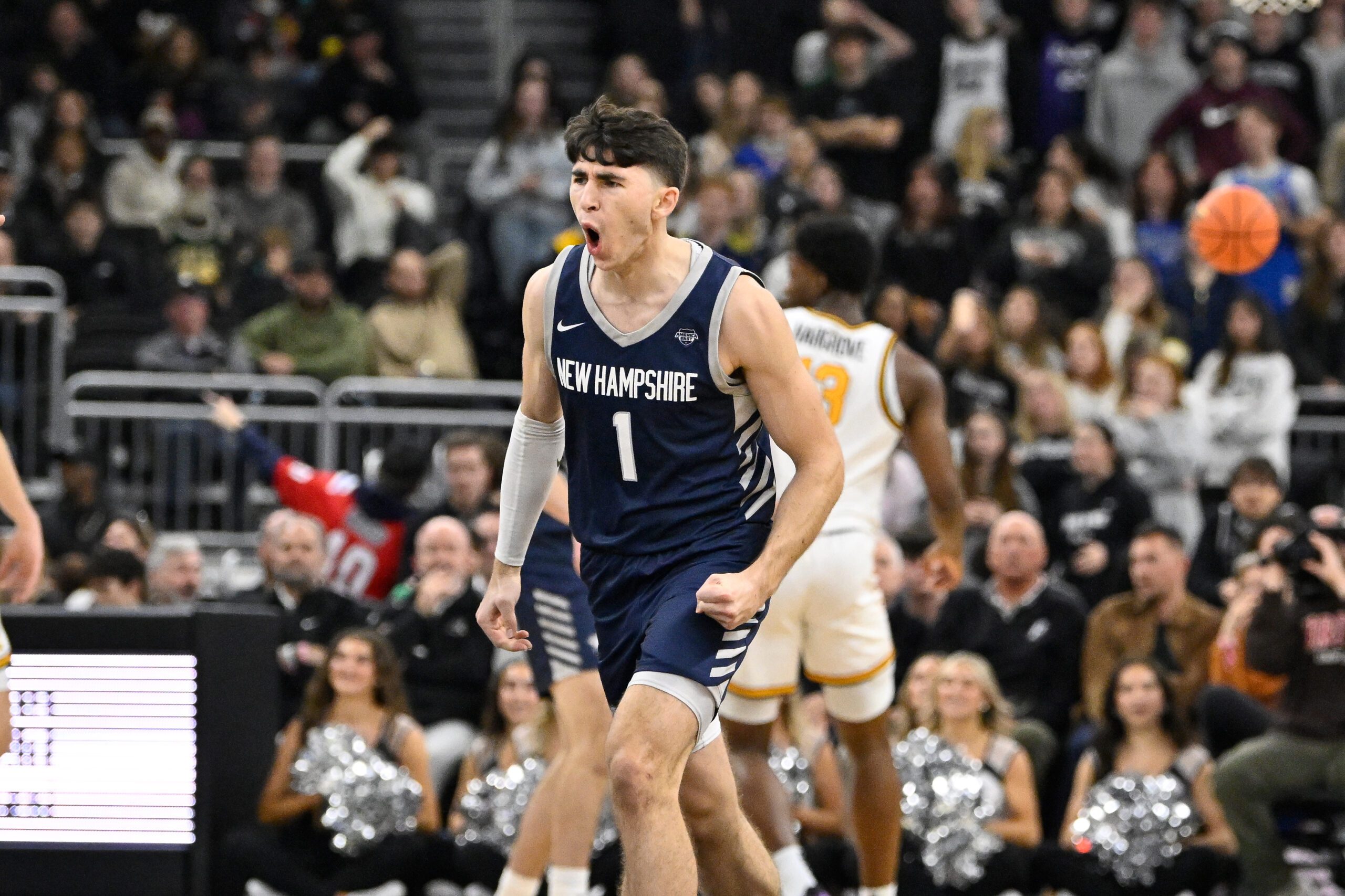 Nov 18, 2025; Providence, Rhode Island, USA; New Hampshire Wildcats guard Jack Graham (1) reacts to his basket against the Providence Friars during the first half at Amica Mutual Pavilion. Mandatory Credit: Eric Canha-Imagn Images