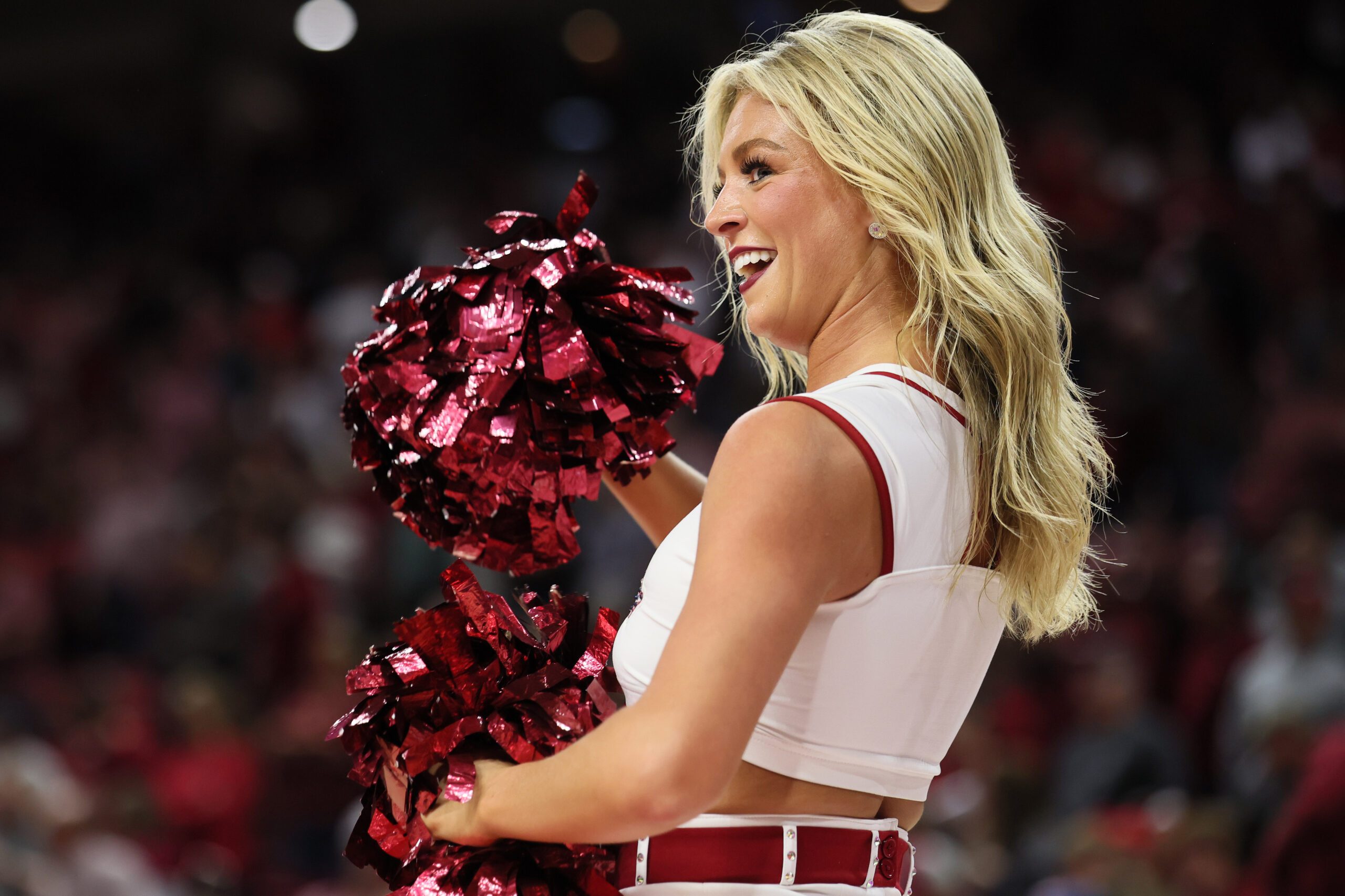Nov 18, 2025; Fayetteville, Arkansas, USA; Arkansas Razorbacks cheerleader during the second half against the Winthrop Eagles  at Bud Walton Arena.  Mandatory Credit: Nelson Chenault-Imagn Images