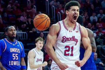 Bradley's AJ Smith reacts to scoring and drawing a foul on a move to the basket against UMass Lowell in the first half of their college basketball game Wednesday, Nov. 19, 2025 at Carver Arena in Peoria. The Braves defeated the River Hawks 87-77.