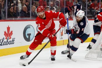 Nov 22, 2025; Detroit, Michigan, USA;  Detroit Red Wings left wing J.T. Compher (37) skates with the puck in the second period against the Columbus Blue Jackets at Little Caesars Arena. Mandatory Credit: Rick Osentoski-Imagn Images