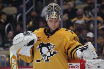 Nov 22, 2025; Pittsburgh, Pennsylvania, USA;  Pittsburgh Penguins goaltender Sergei Murashov (1) looks on during a second period time-out against the Seattle Kraken at PPG Paints Arena. Mandatory Credit: Charles LeClaire-Imagn Images