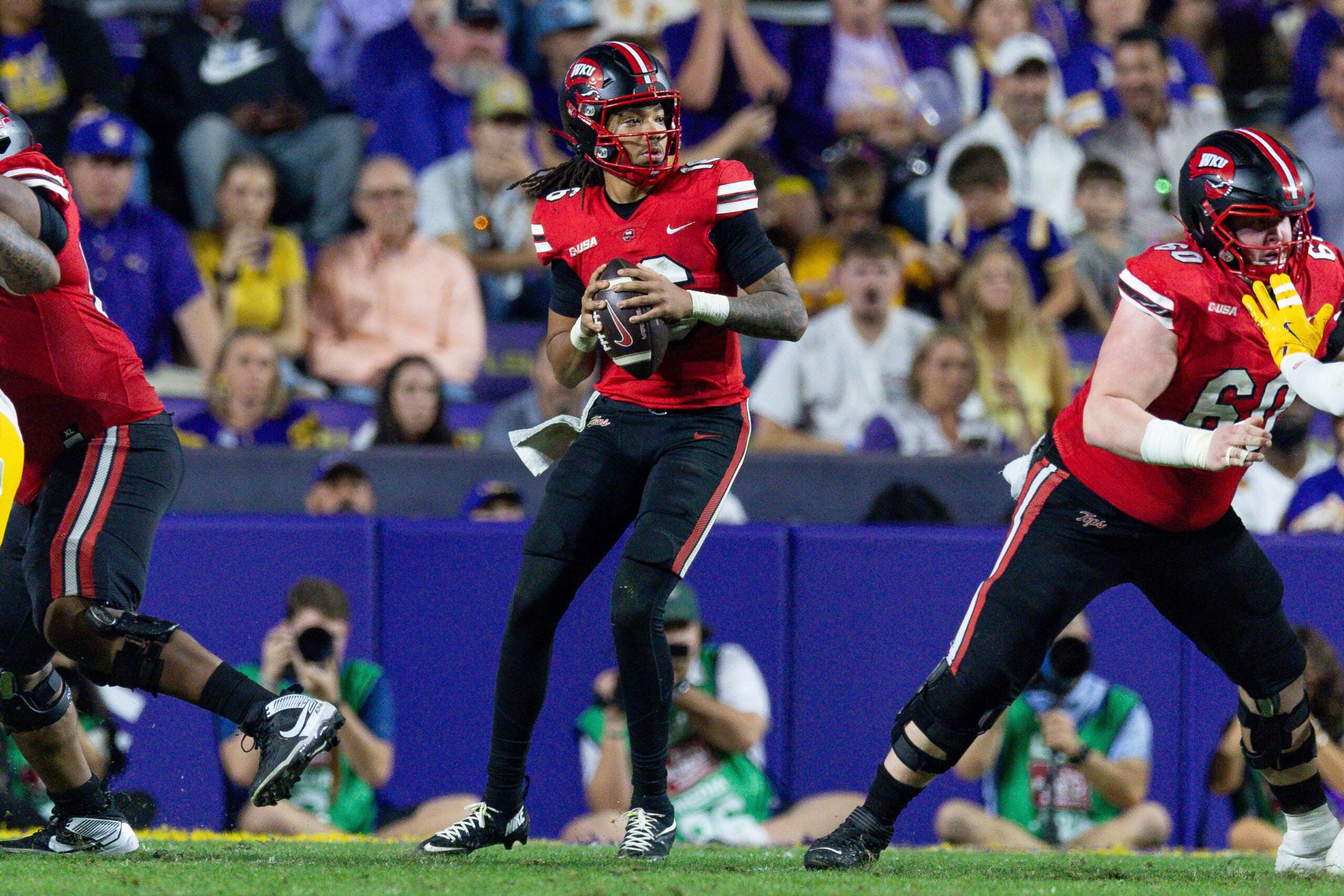 Nov 22, 2025; Baton Rouge, Louisiana, USA;  Western Kentucky Hilltoppers quarterback Rodney Tisdale Jr. (16) passes against the LSU Tigers during the second half at Tiger Stadium. Mandatory Credit: Stephen Lew-Imagn Images