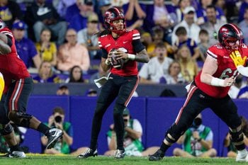 Nov 22, 2025; Baton Rouge, Louisiana, USA;  Western Kentucky Hilltoppers quarterback Rodney Tisdale Jr. (16) passes against the LSU Tigers during the second half at Tiger Stadium. Mandatory Credit: Stephen Lew-Imagn Images