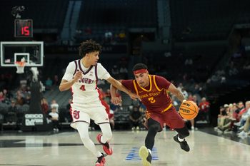 Nov 24, 2025; Las Vegas, Nevada, USA; Iowa State Cyclones guard Tamin Lipsey (3) drives to the hoop past St. John's Red Storm guard Oziyah Sellers (4) during the second half in a 2025 Players Era Festival group play game at Michelob Ultra Arena. Mandatory Credit: Kirby Lee-Imagn Images