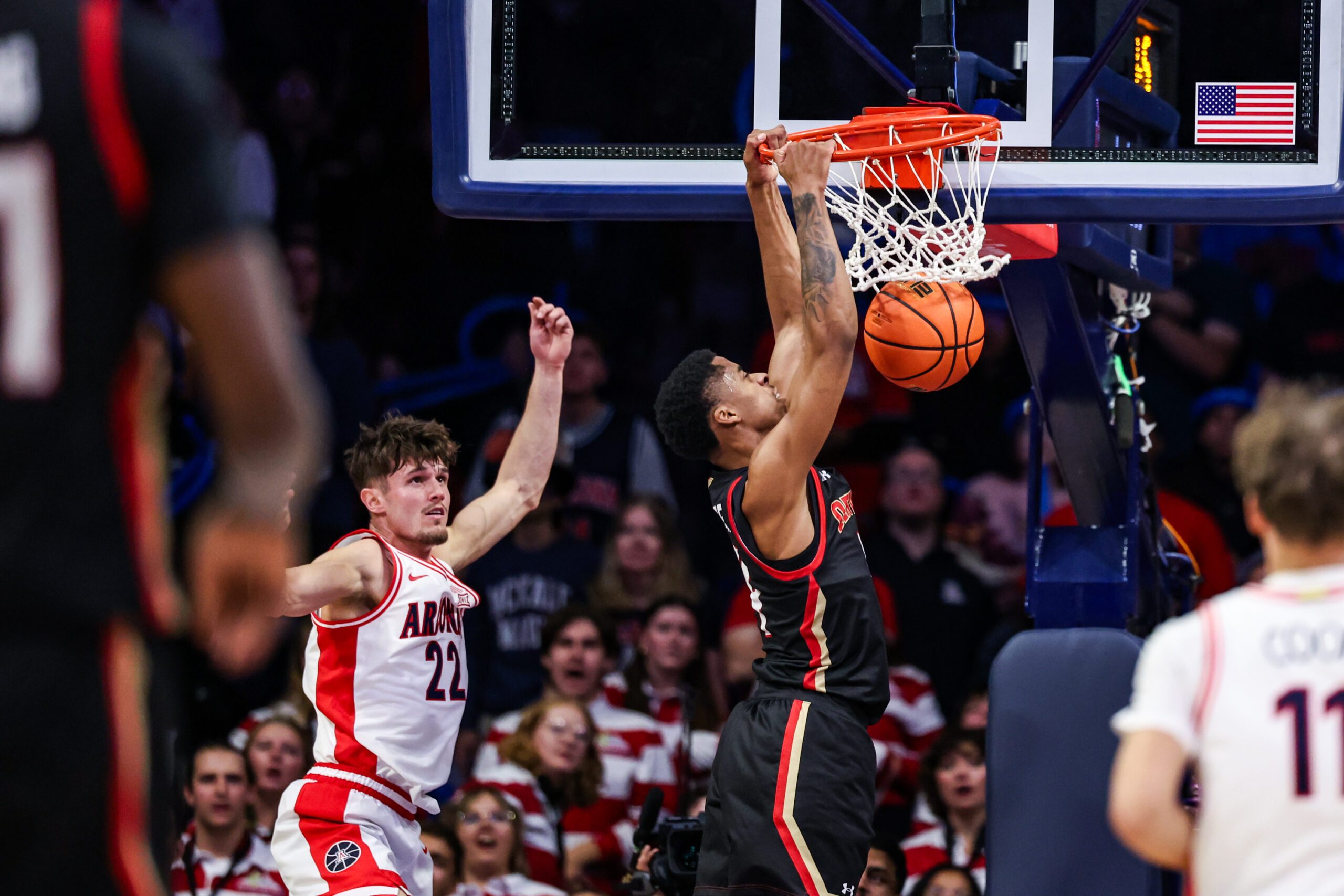 Nov 24, 2025; Tucson, Arizona, USA; Denver Pioneers guard Corleone Dandridge (4) dunks the ball during the second half of the game against the Arizona Wildcats at McKale Memorial Center. Mandatory Credit: Aryanna Frank-Imagn Images