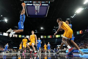 Nov 25, 2025; Las Vegas, Nevada, USA; Creighton Bluejays forward Jasen Green (0) dunks the ball against the Iowa State Cyclones during the first half in a 2025 Players Era Festival group play game at Michelob Ultra Arena. Mandatory Credit: Kirby Lee-Imagn Images