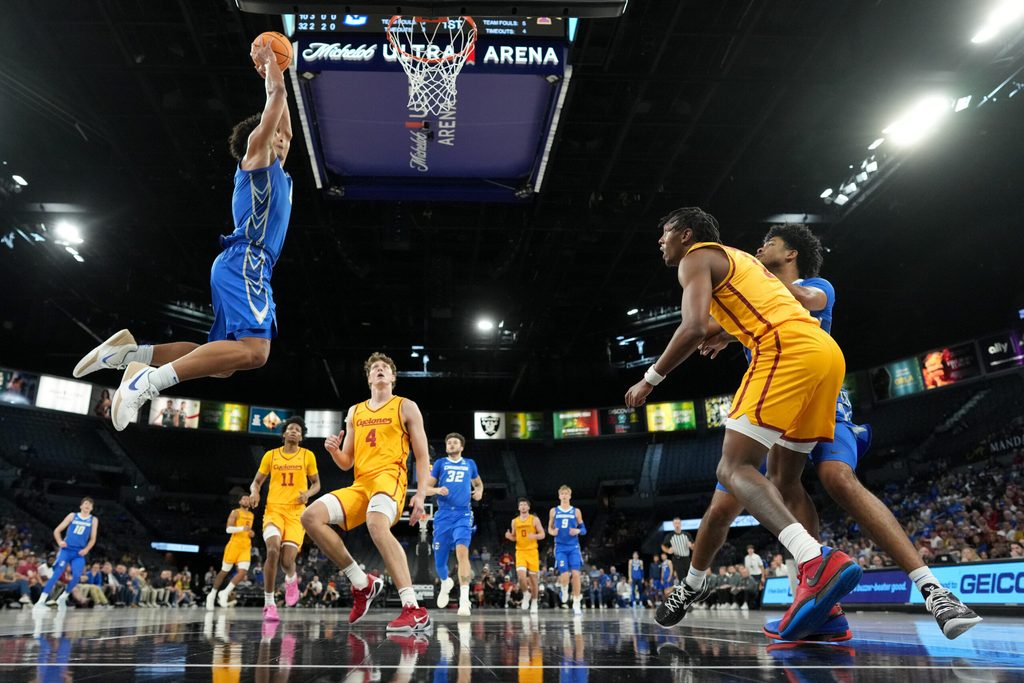 Nov 25, 2025; Las Vegas, Nevada, USA; Creighton Bluejays forward Jasen Green (0) dunks the ball against the Iowa State Cyclones during the first half in a 2025 Players Era Festival group play game at Michelob Ultra Arena. Mandatory Credit: Kirby Lee-Imagn Images