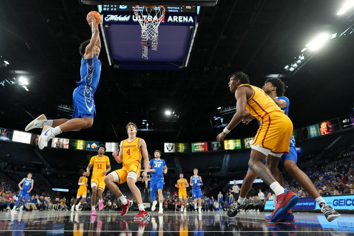Nov 25, 2025; Las Vegas, Nevada, USA; Creighton Bluejays forward Jasen Green (0) dunks the ball against the Iowa State Cyclones during the first half in a 2025 Players Era Festival group play game at Michelob Ultra Arena. Mandatory Credit: Kirby Lee-Imagn Images