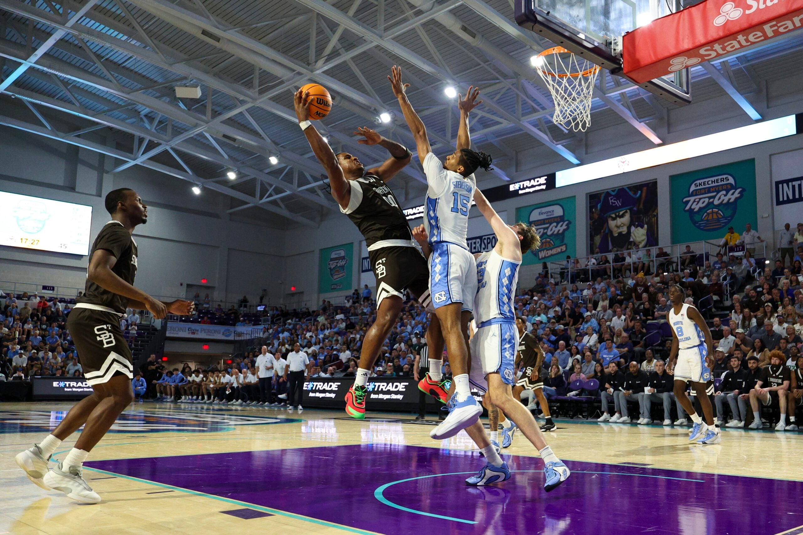 Nov 25, 2025; Fort Myers, Florida, USA; St. Bonaventure Bonnies forward Frank Mitchell (00) shoots the ball over North Carolina Tar Heels forward Jarin Stevenson (15) in the second half at Suncoast Credit Union Arena. Mandatory Credit: Nathan Ray Seebeck-Imagn Images