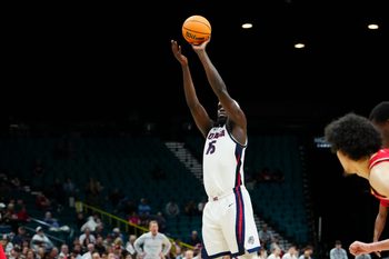 Nov 25, 2025; Las Vegas, NV, USA; Gonzaga Bulldogs forward Graham Ike (15) shoots a free throw in the first half against Maryland Terrapins a 2025 Players Era Festival group play game at MGM Grand Garden Arena. Mandatory Credit: Stephen R. Sylvanie-Imagn Images