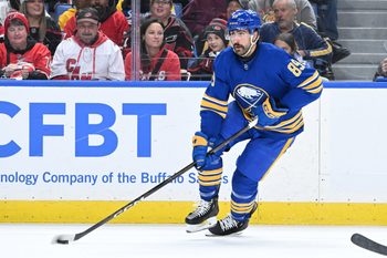 Nov 23, 2025; Buffalo, New York, USA; Buffalo Sabres right wing Alex Tuch (89) handles the puck in the second period against the Carolina Hurricanes at KeyBank Center. Mandatory Credit: Mark Konezny-Imagn Images
