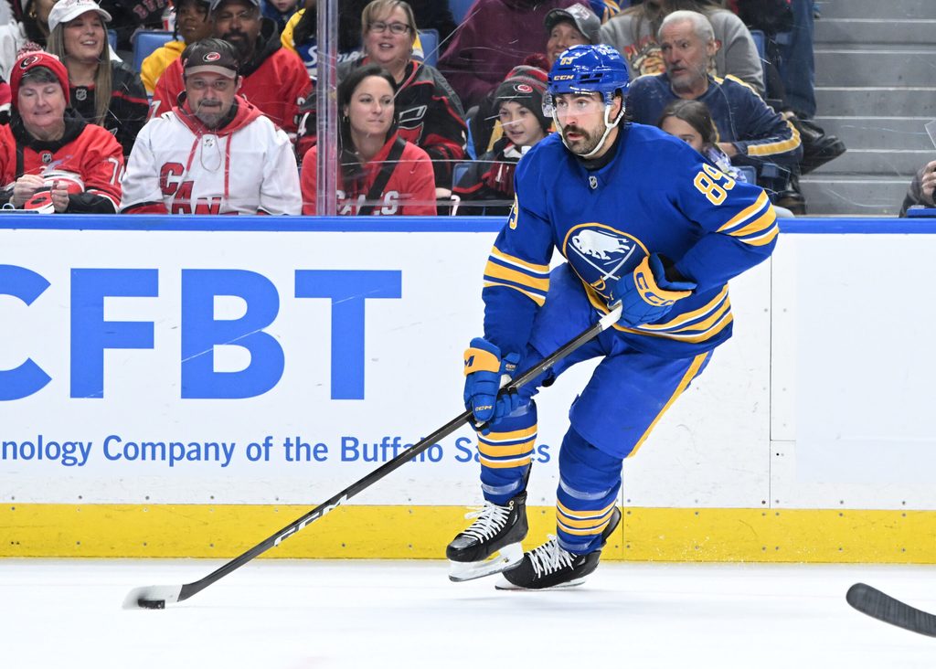 Nov 23, 2025; Buffalo, New York, USA; Buffalo Sabres right wing Alex Tuch (89) handles the puck in the second period against the Carolina Hurricanes at KeyBank Center. Mandatory Credit: Mark Konezny-Imagn Images