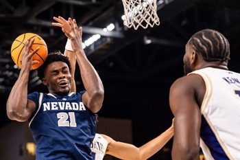 Nevada Wolf Pack center Joel Armotrading (21) loses control of a rebound during the first half of their game in the Acrisure Series in Palm Desert, Calif., Thursday, Nov. 27, 2025.