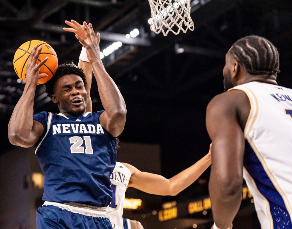 Nevada Wolf Pack center Joel Armotrading (21) loses control of a rebound during the first half of their game in the Acrisure Series in Palm Desert, Calif., Thursday, Nov. 27, 2025.