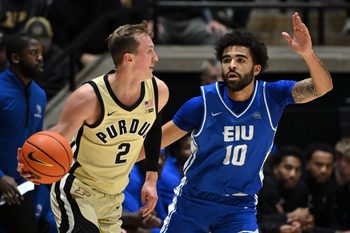 Nov 28, 2025; West Lafayette, Indiana, USA; Eastern Illinois Panthers guard Preston Turner (10) defends against Purdue Boilermakers guard Fletcher Loyer (2) during the first half at Mackey Arena. Mandatory Credit: Marc Lebryk-Imagn Images