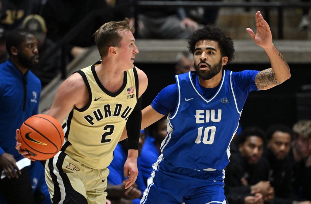 Nov 28, 2025; West Lafayette, Indiana, USA; Eastern Illinois Panthers guard Preston Turner (10) defends against Purdue Boilermakers guard Fletcher Loyer (2) during the first half at Mackey Arena. Mandatory Credit: Marc Lebryk-Imagn Images
