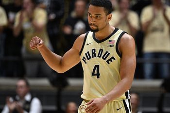 Nov 28, 2025; West Lafayette, Indiana, USA; Purdue Boilermakers forward Trey Kaufman-Renn (4) celebrates a basket during a timeout during the second half against the Eastern Illinois Panthers at Mackey Arena. Mandatory Credit: Marc Lebryk-Imagn Images