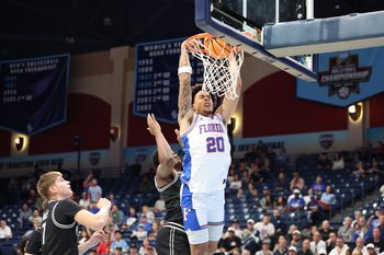 Nov 28, 2025; San Diego, CA, USA; Florida Gators guard Isaiah Brown (20) dunks the ball against the Providence Friars during the first half at Jenny Craig Pavilion. Mandatory Credit: Abe Arredondo-Imagn Images