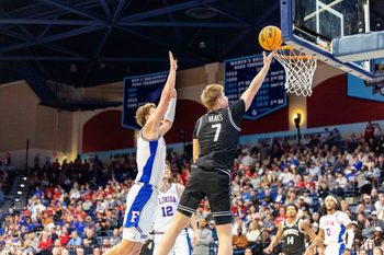 Nov 28, 2025; San Diego, CA, USA; Providence Friars guard Stefan Vaaks (7) shoots a layup against the Florida Gators during the second half at Jenny Craig Pavilion. Mandatory Credit: Abe Arredondo-Imagn Images