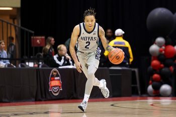 Nov 28, 2025; Kissimmee, FL, USA; Georgetown Hoyas guard Malik Mack (2) controls the ball against the Miami (FL) Hurricanes in the first half during the ESPN Events Invitational at State Farm Field House. Mandatory Credit: Nathan Ray Seebeck-Imagn Images