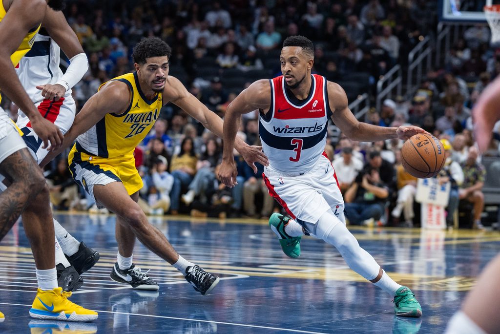 Nov 28, 2025; Indianapolis, Indiana, USA; Washington Wizards guard CJ McCollum (3) dribbles the ball while Indiana Pacers guard Ben Sheppard (26) defends in the second half at Gainbridge Fieldhouse. Mandatory Credit: Trevor Ruszkowski-Imagn Images