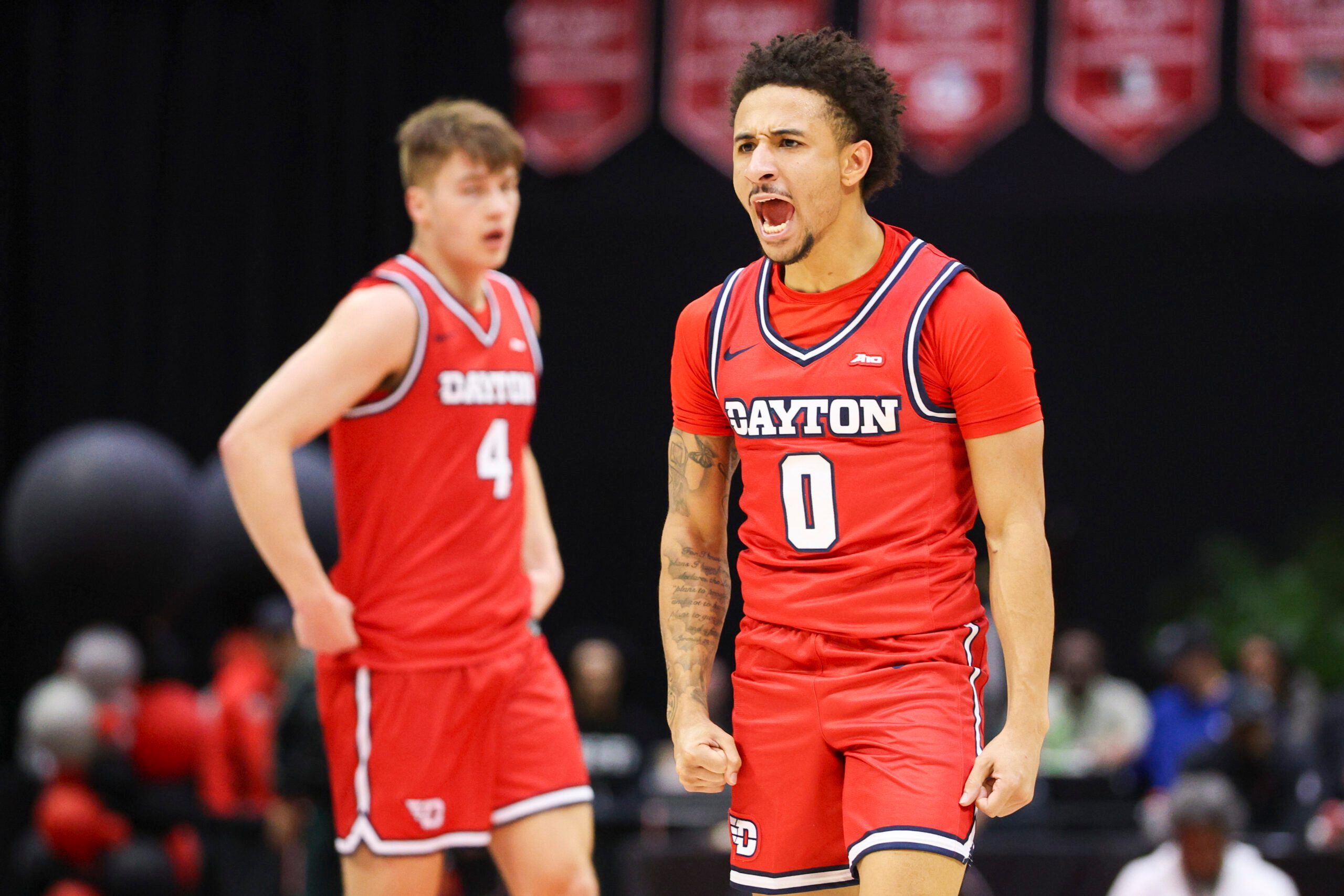 Nov 28, 2025; Kissimmee, FL, USA; Dayton Flyers guard Javon Bennett (0) reacts after a basket against the Brigham Young University Cougars in the first half during the ESPN Events Invitational at State Farm Field House. Mandatory Credit: Nathan Ray Seebeck-Imagn Images