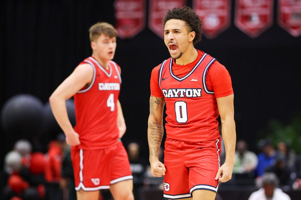 Nov 28, 2025; Kissimmee, FL, USA; Dayton Flyers guard Javon Bennett (0) reacts after a basket against the Brigham Young University Cougars in the first half during the ESPN Events Invitational at State Farm Field House. Mandatory Credit: Nathan Ray Seebeck-Imagn Images