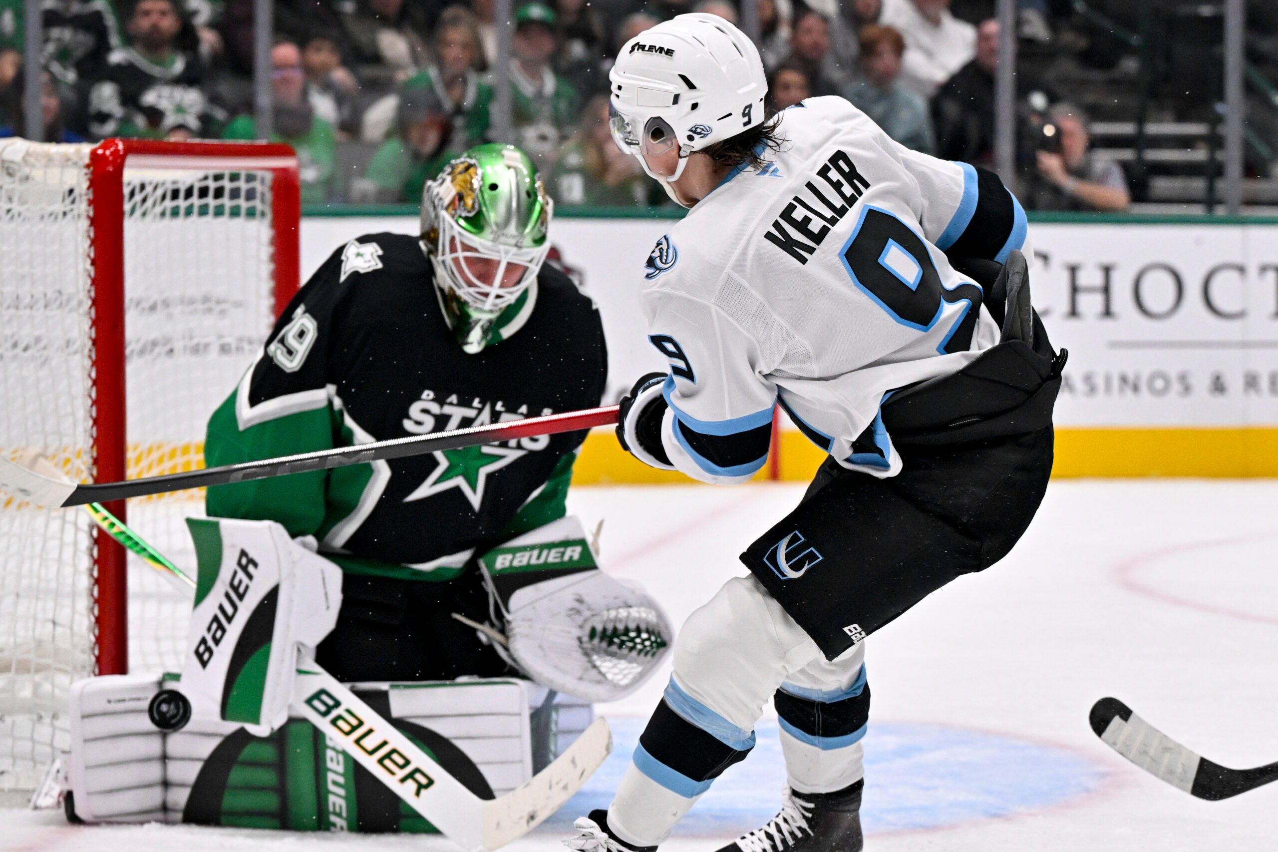 Nov 28, 2025; Dallas, Texas, USA; Dallas Stars goaltender Jake Oettinger (29) stops a shot by Utah Mammoth center Clayton Keller (9) during the third period at the American Airlines Center. Mandatory Credit: Jerome Miron-Imagn Images