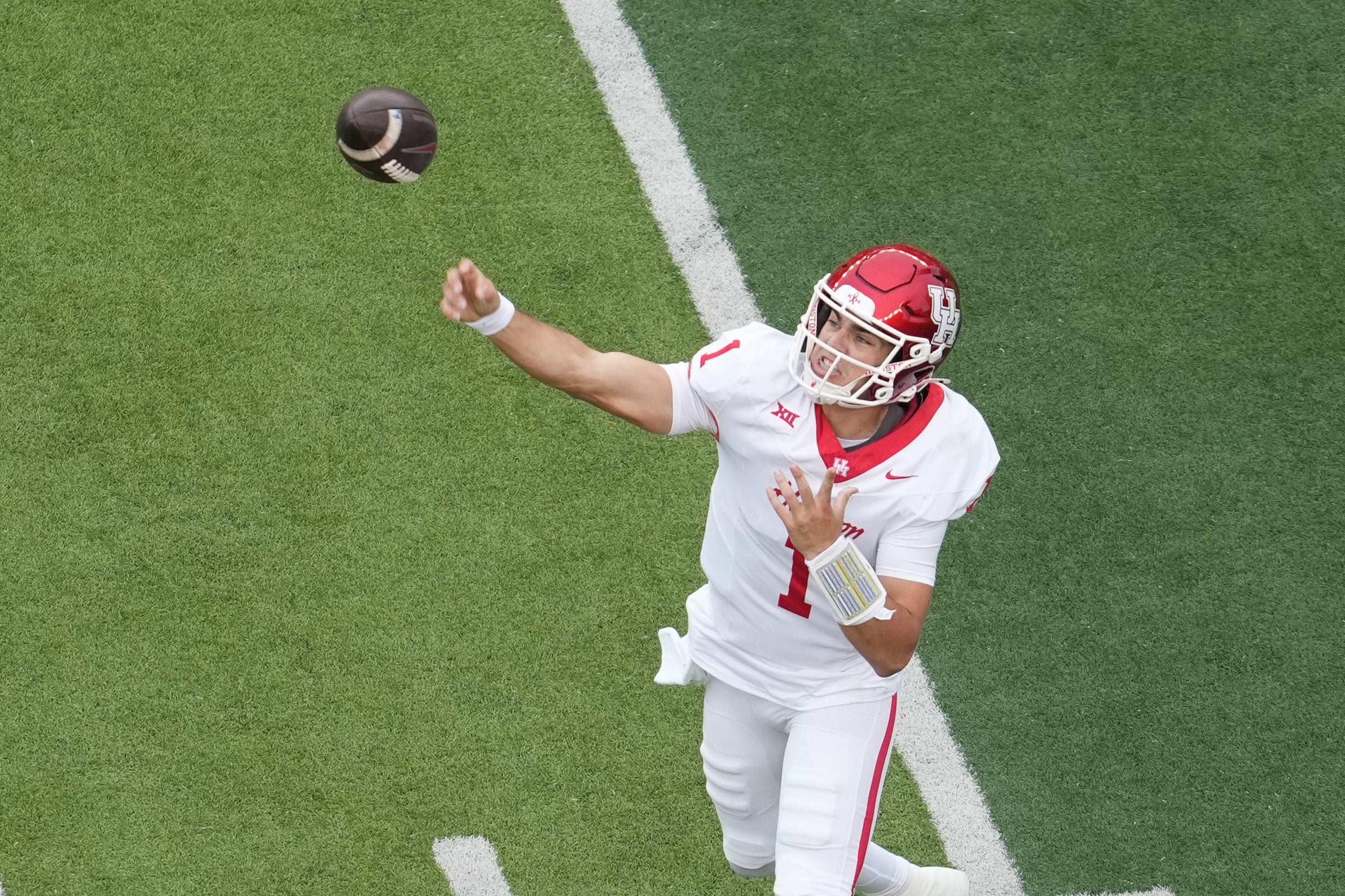 Nov 29, 2025; Waco, Texas, USA;  Houston Cougars quarterback Conner Weigman (1) passes the ball against the Baylor Bears during the first half at McLane Stadium. Mandatory Credit: Chris Jones-Imagn Images