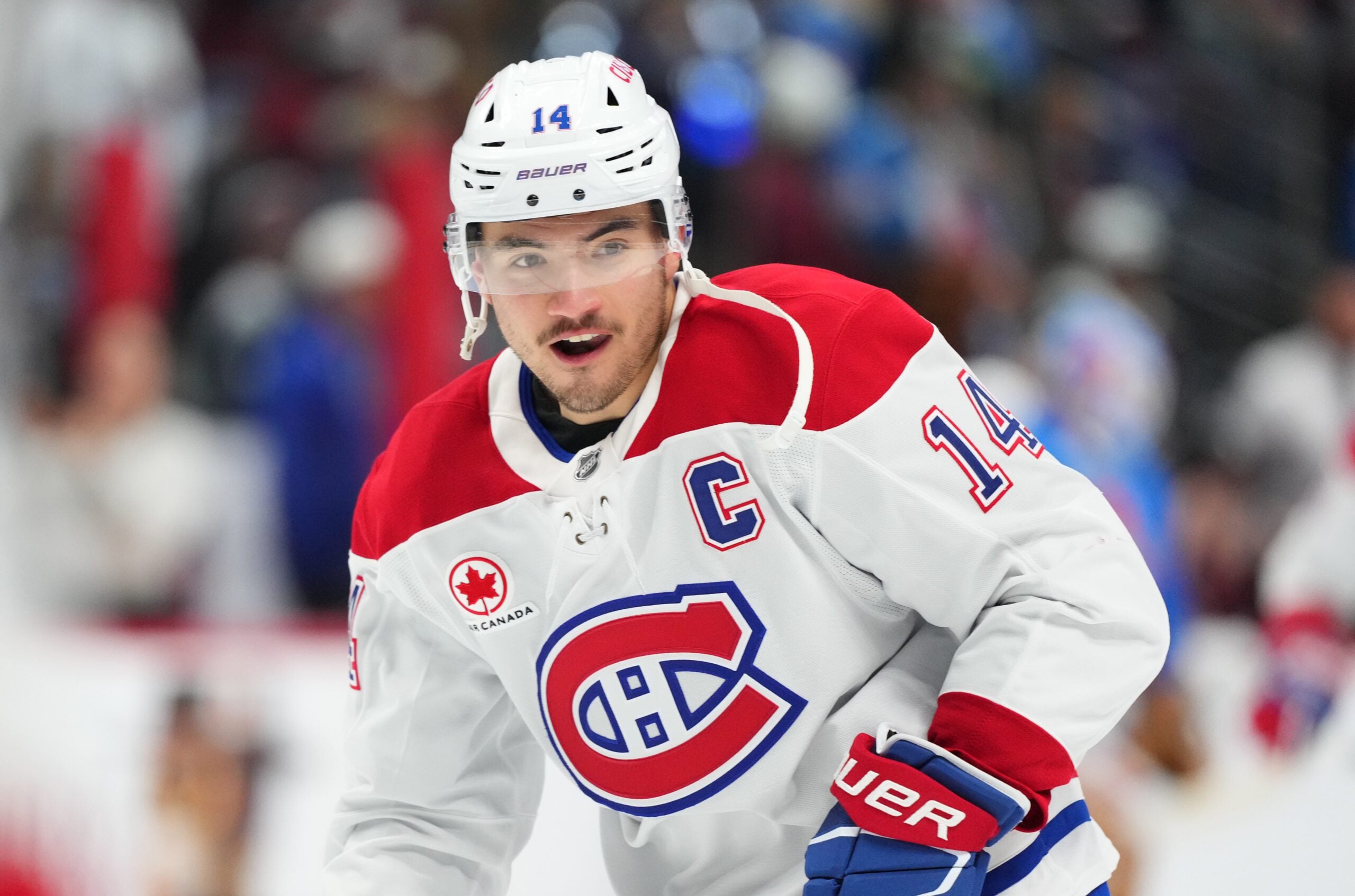Nov 29, 2025; Denver, Colorado, USA; Montreal Canadiens center Nick Suzuki (14) before the game against the Colorado Avalanche at Ball Arena. Mandatory Credit: Ron Chenoy-Imagn Images