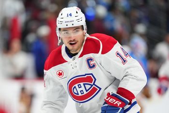 Nov 29, 2025; Denver, Colorado, USA; Montreal Canadiens center Nick Suzuki (14) before the game against the Colorado Avalanche at Ball Arena. Mandatory Credit: Ron Chenoy-Imagn Images