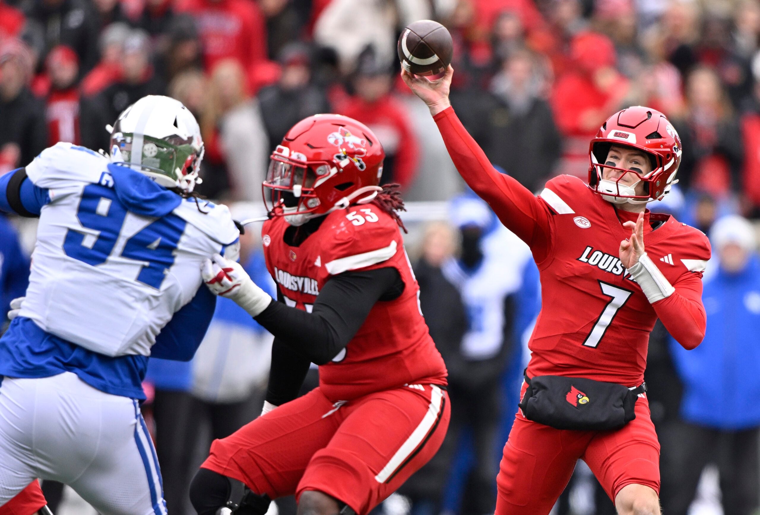 Nov 29, 2025; Louisville, Kentucky, USA;  Louisville Cardinals quarterback Miller Moss (7) attempts to pass against the Kentucky Wildcats during the first half at L&N Federal Credit Union Stadium. Louisville defeated Kentucky 41-0. Mandatory Credit: Jamie Rhodes-Imagn Images