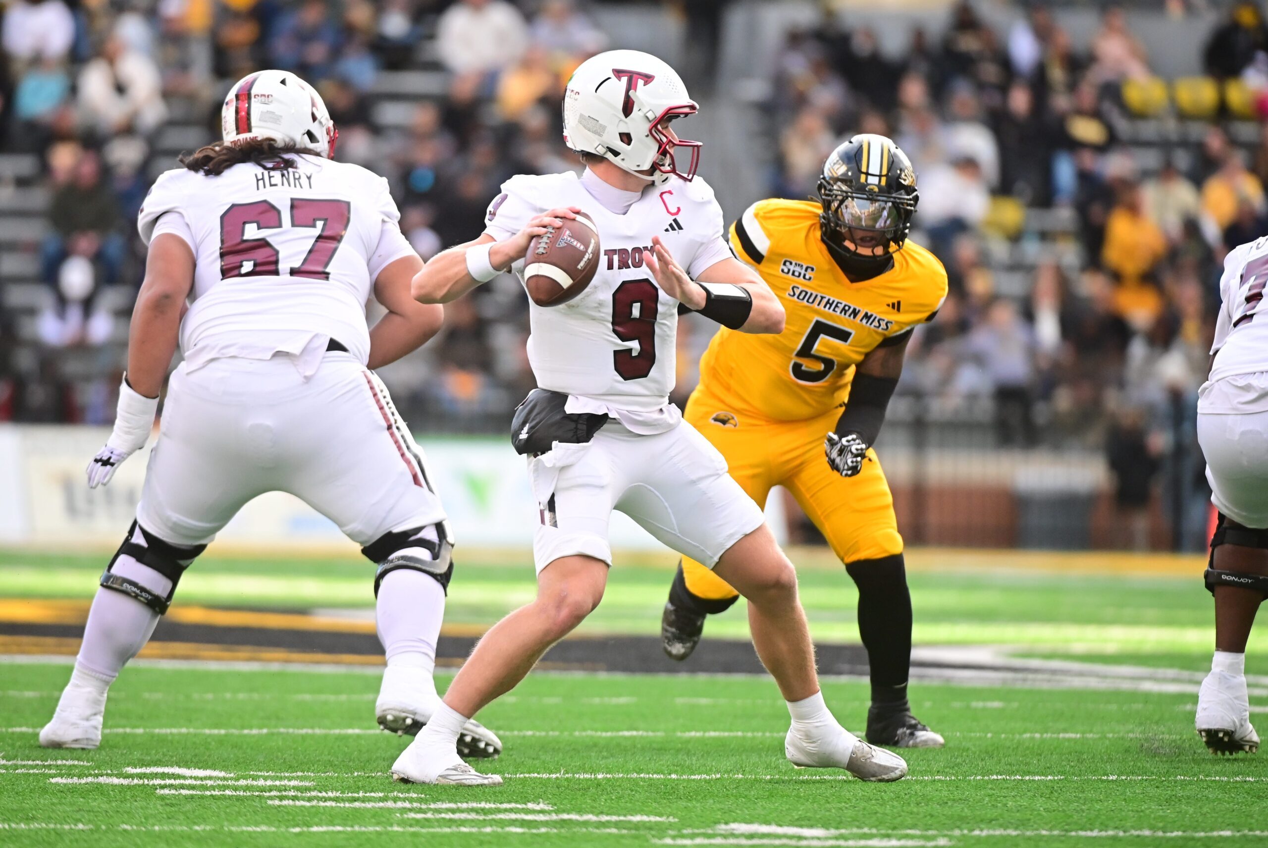 Troy Trojans quarterback Goose Crowder (9) looks to pass during a college football game between Southern Miss and Troy at M.M. Roberts Stadium in Hattiesburg, Miss., on Saturday, Nov. 29, 2025.
