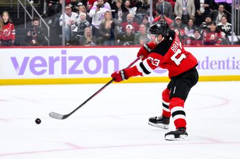 Nov 29, 2025; Newark, New Jersey, USA; New Jersey Devils left wing Jesper Bratt (63) shoots against the Philadelphia Flyers during the second period at Prudential Center. Mandatory Credit: John Jones-Imagn Images