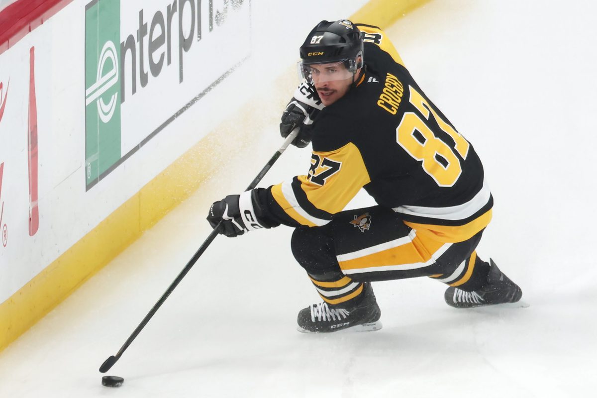 Nov 29, 2025; Pittsburgh, Pennsylvania, USA; Pittsburgh Penguins center Sidney Crosby (87) handles the puck against the Toronto Maple Leafs during the third period at PPG Paints Arena. Mandatory Credit: Charles LeClaire-Imagn Images