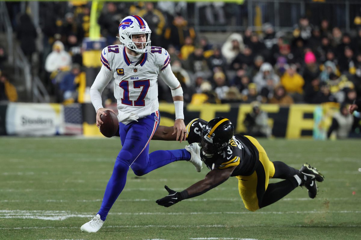 Nov 30, 2025; Pittsburgh, Pennsylvania, USA; Buffalo Bills quarterback Josh Allen (17) looks to pass as Pittsburgh Steelers defensive end Esezi Otomewo (93) attempts to tackle during the second quarter at Acrisure Stadium. Mandatory Credit: Charles LeClaire-Imagn Images