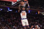 Nov 30, 2025; New York, New York, USA;  New York Knicks guard Jordan Clarkson (00) dunks in the fourth quarter against the Toronto Raptors at Madison Square Garden. Mandatory Credit: Wendell Cruz-Imagn Images