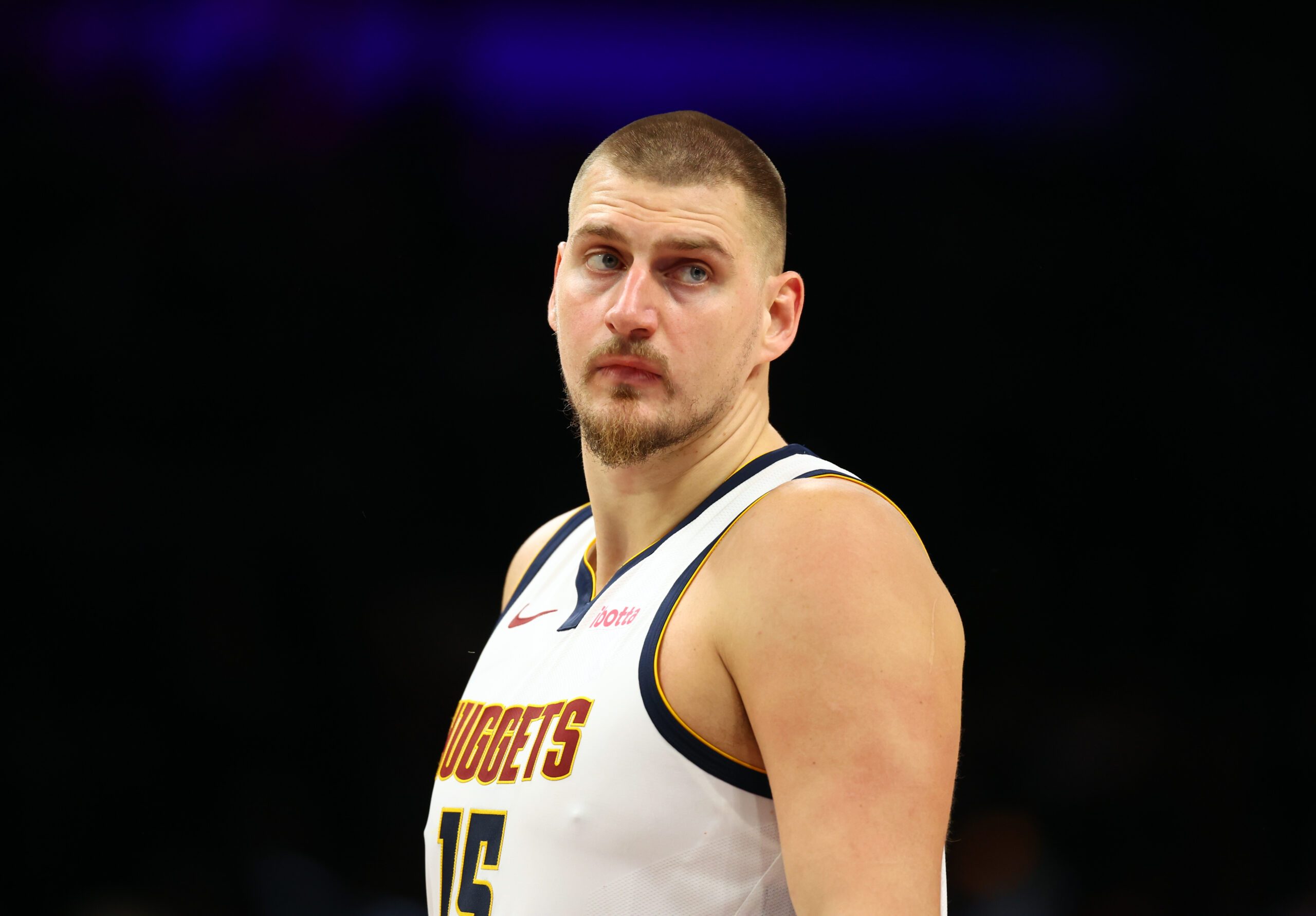 Nov 29, 2025; Phoenix, Arizona, USA; Denver Nuggets center Nikola Jokic (15) against the Phoenix Suns at the Mortgage Matchup Center. Mandatory Credit: Mark J. Rebilas-Imagn Images