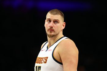 Nov 29, 2025; Phoenix, Arizona, USA; Denver Nuggets center Nikola Jokic (15) against the Phoenix Suns at the Mortgage Matchup Center. Mandatory Credit: Mark J. Rebilas-Imagn Images