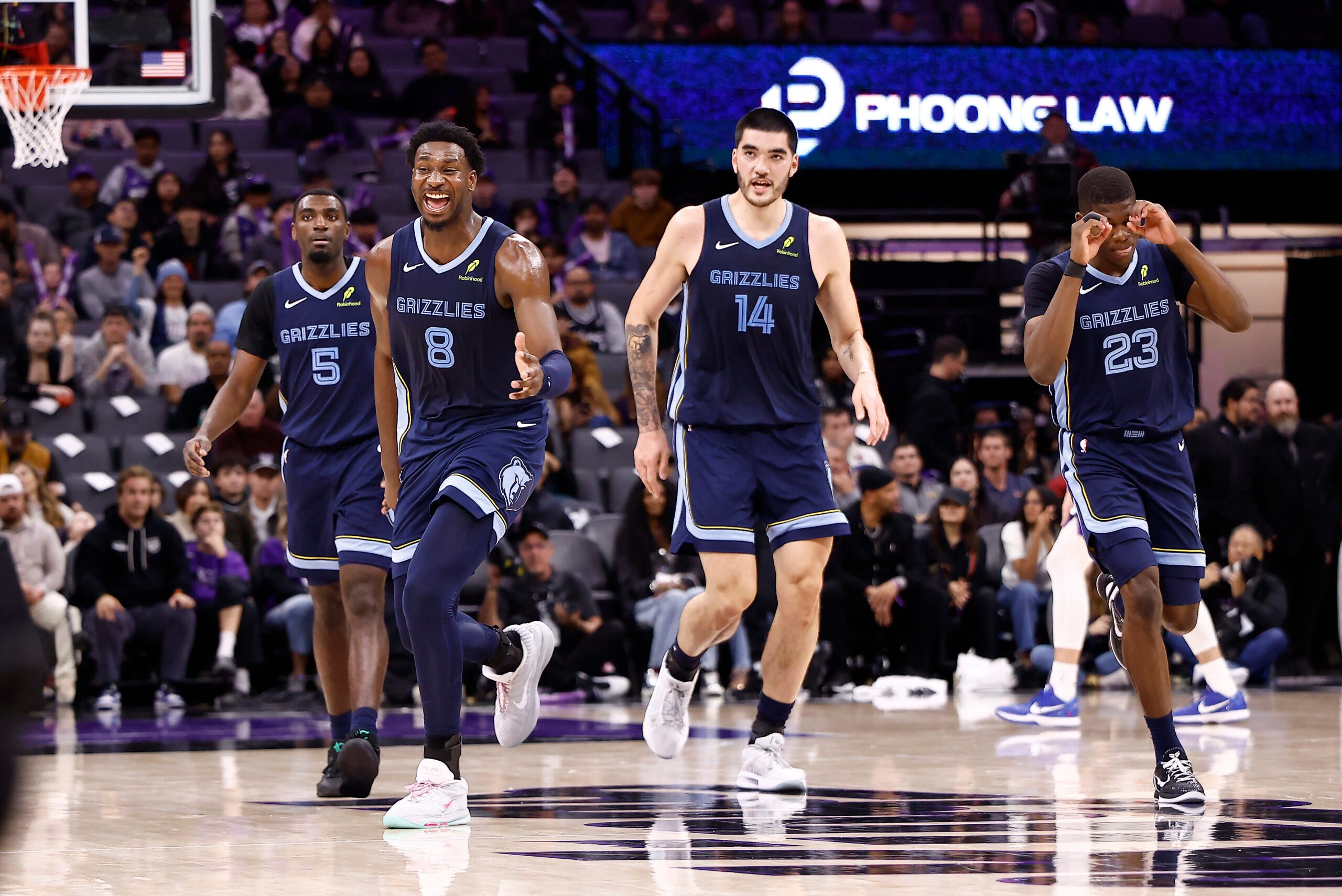 Nov 30, 2025; Sacramento, California, USA; Memphis Grizzlies forward/center Jaren Jackson Jr. (8) celebrates after a play as a timeout is called during the fourth quarter at Golden 1 Center. Mandatory Credit: Kelley L Cox-Imagn Images