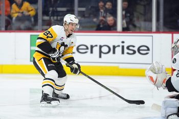 Dec 1, 2025; Philadelphia, Pennsylvania, USA; Pittsburgh Penguins center Sidney Crosby (87) controls the puck against the Philadelphia Flyers in the second period at Xfinity Mobile Arena. Mandatory Credit: Kyle Ross-Imagn Images