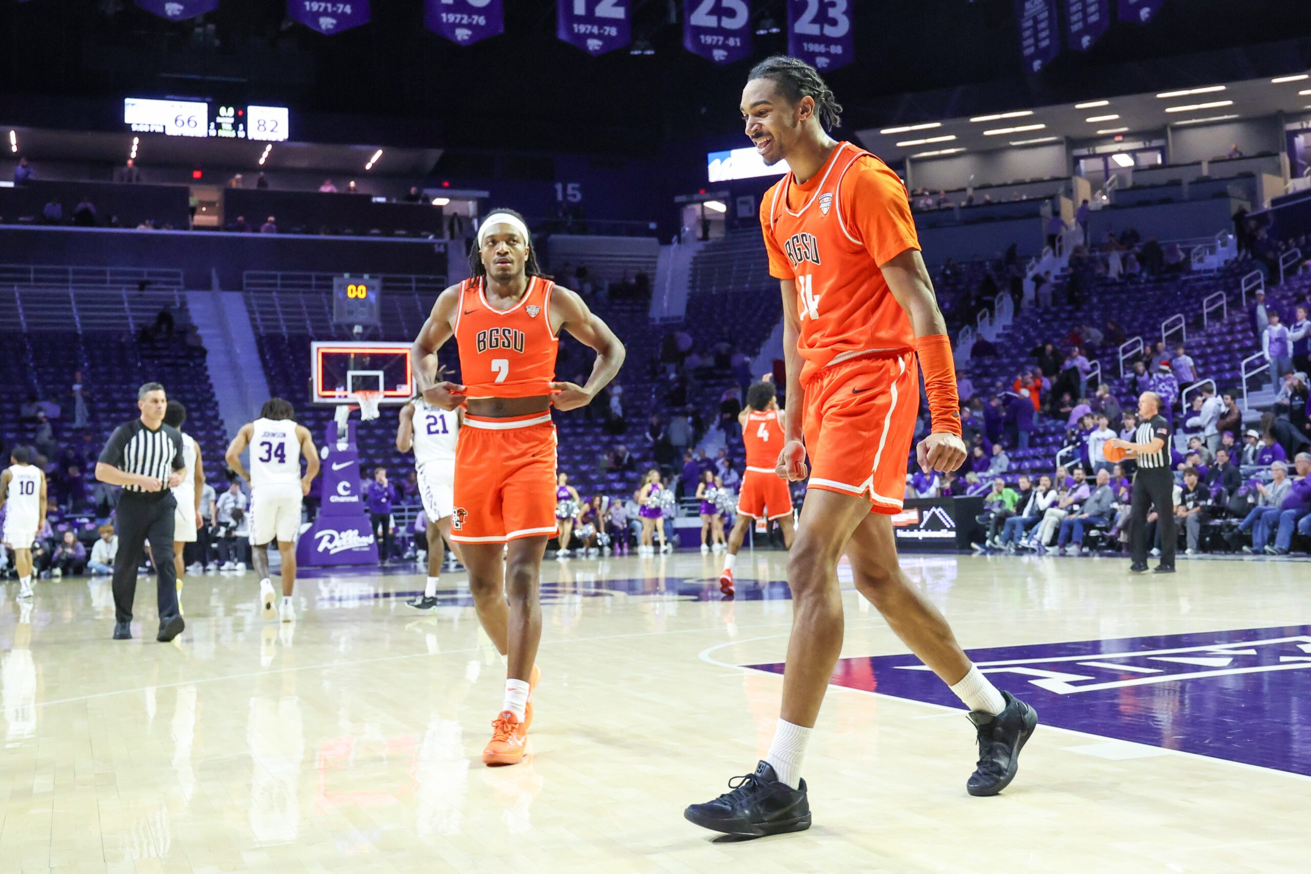 Dec 1, 2025; Manhattan, Kansas, USA; Bowling Green Falcons forward Sam Towns (14) and guard Javontae Campbell (2) celebrate a win against the Kansas State Wildcats at Bramlage Coliseum. Mandatory Credit: Scott Sewell-Imagn Images