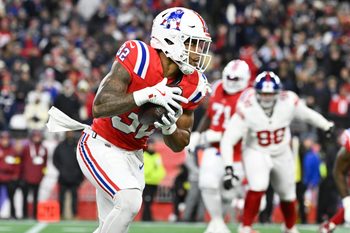 Dec 1, 2025; Foxborough, Massachusetts, USA; New England Patriots running back TreVeyon Henderson (32) runs the ball during the second quarter against the New York Giants at Gillette Stadium. Mandatory Credit: Eric Canha-Imagn Images