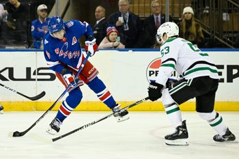 Dec 2, 2025; New York, New York, USA;  New York Rangers left wing Artemi Panarin (10) attempts a shot defend by Dallas Stars center Wyatt Johnston (53) during the third period at Madison Square Garden. Mandatory Credit: Dennis Schneidler-Imagn Images