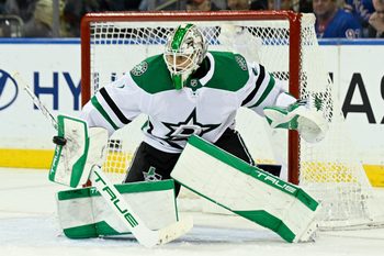 Dec 2, 2025; New York, New York, USA;  Dallas Stars goaltender Casey Desmith (1) makes a save against the New York Rangers during the third period at Madison Square Garden. Mandatory Credit: Dennis Schneidler-Imagn Images
