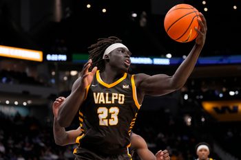 Dec 2, 2025; Milwaukee, Wisconsin, USA;  Valparaiso Beacons center Shon Tupuola (23) reaches for a rebound during the second half against the Marquette Golden Eagles at Fiserv Forum. Mandatory Credit: Jeff Hanisch-Imagn Images