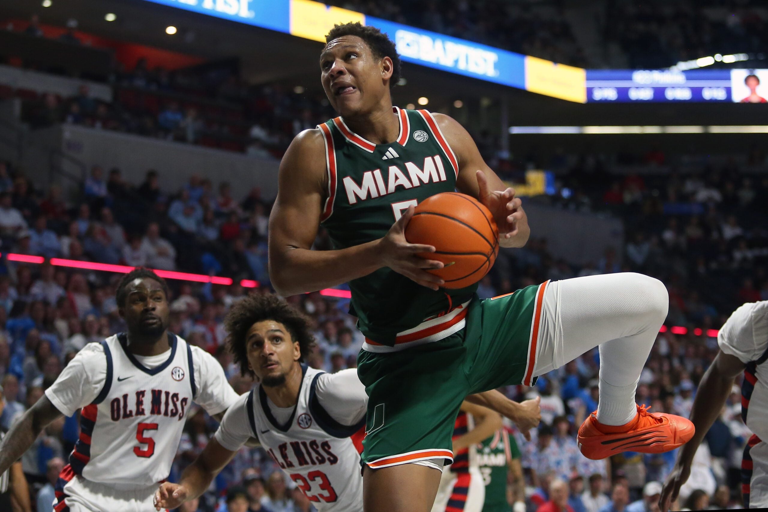 Dec 2, 2025; Oxford, Mississippi, USA; Miami Hurricanes forward Malik Reneau (5) drives to the basket during the first half against the Mississippi Rebels at The Sandy and John Black Pavilion at Ole Miss. Mandatory Credit: Petre Thomas-Imagn Images