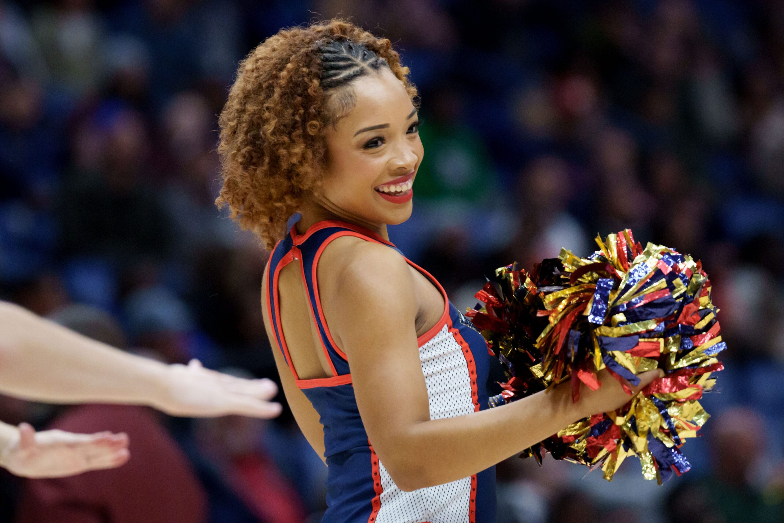 Dec 2, 2025; New Orleans, Louisiana, USA; A member of the New Orleans Pelicans PelSquad dances at Smoothie King Center. Mandatory Credit: Matthew Hinton-Imagn Images
